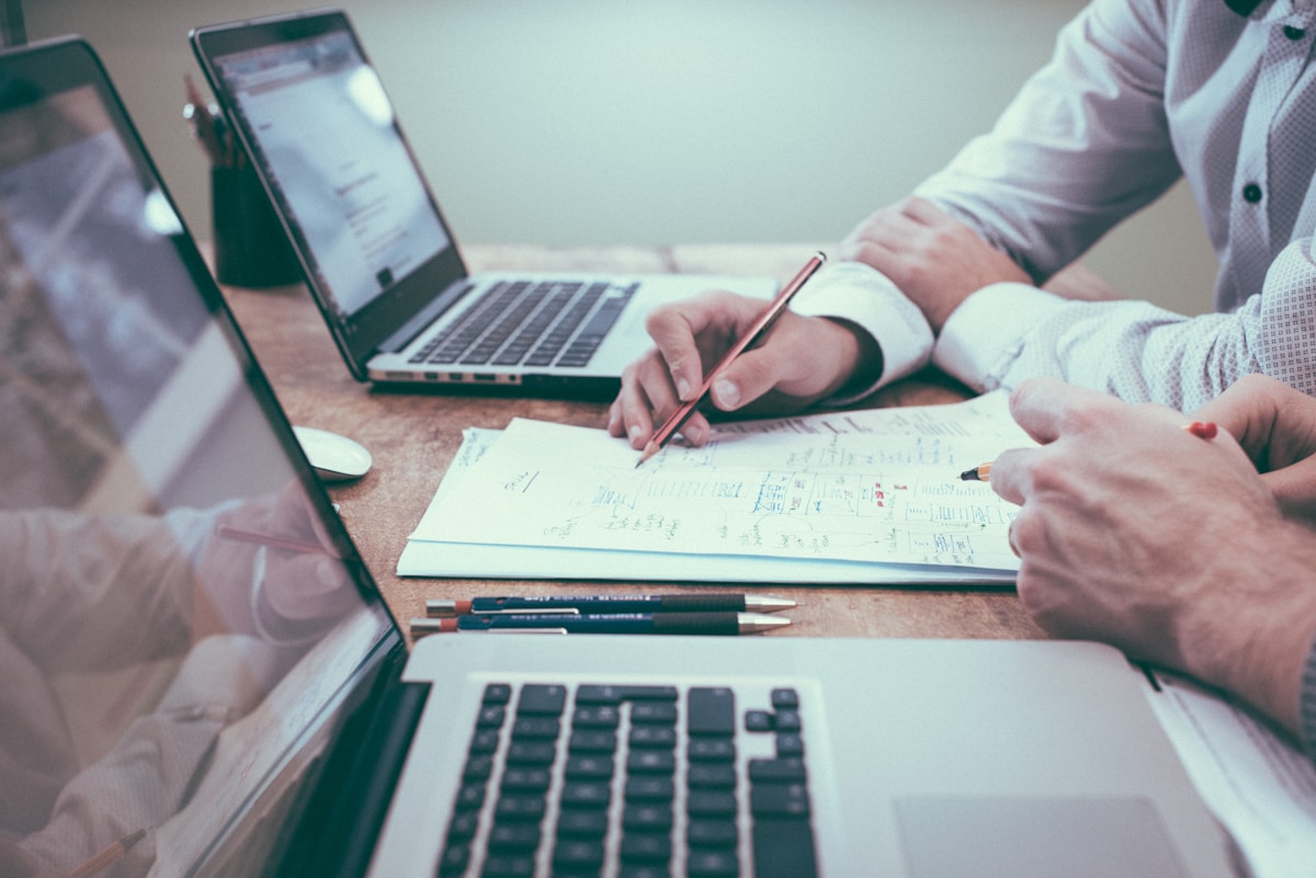 Executive reviewing AI strategy notes at desk